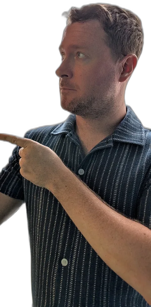 James pointing towards the corporate training information