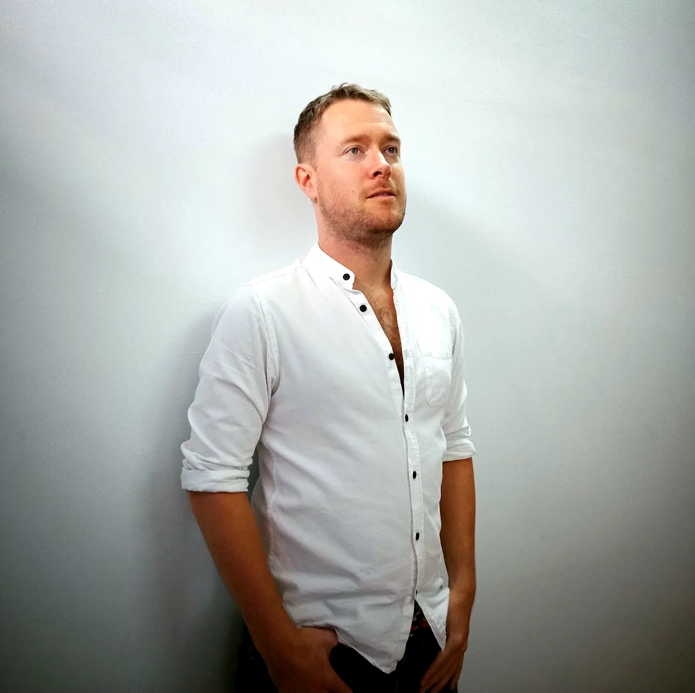 James in a white shirt