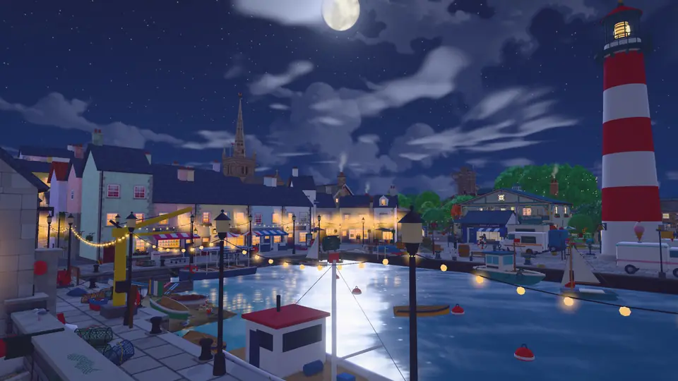 The harbour at night under a full moon: lit windows on the water, boats and a red and white lighthouse.
