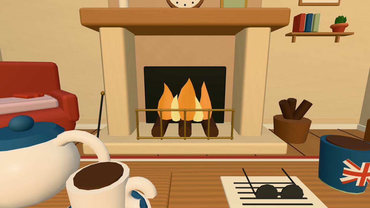 A cosy living room with a fire, a teapot and a Union Jack mug