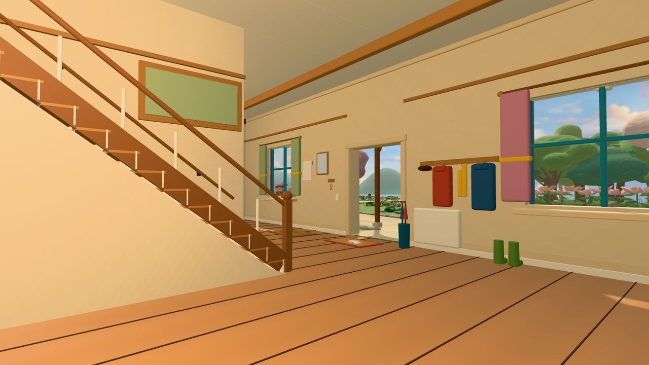 The cottage hallway with stairs, coats and wellies