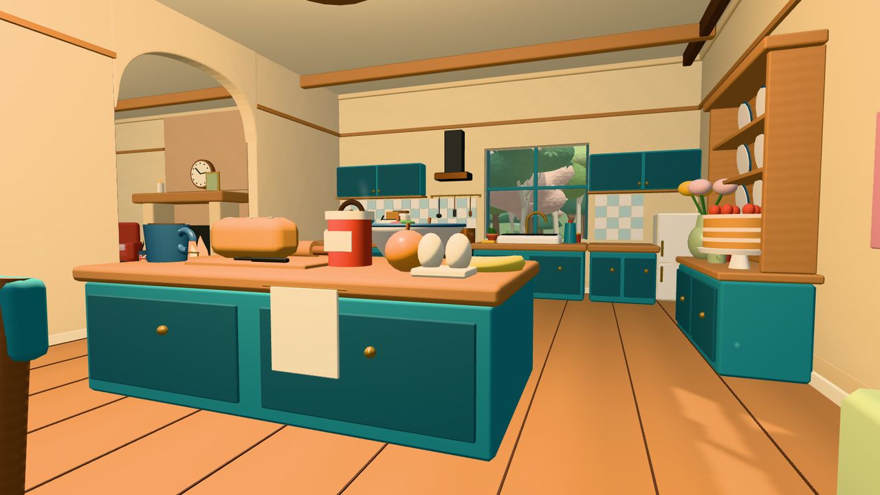 A British cottage kitchen with a kettle, dresser and fridge
